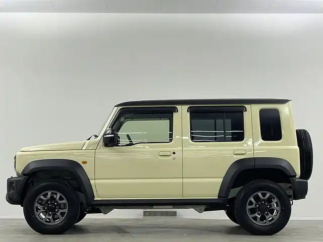スズキ ジムニー ノマド FC 埼玉県 2025(令7)年 0.1千km ベージュ 登録済未使用車 温シート 追従走行 ETC ミラーシート コーナーセンサー オートハイビーム レーンキープアシスト ダウンヒルアシストコントロール 背面タイヤ 衝突軽減システム スマートキー