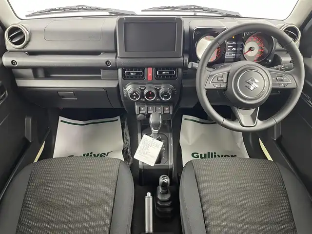 スズキ ジムニー ノマド FC 埼玉県 2025(令7)年 0.1千km ベージュ 登録済未使用車 温シート 追従走行 ETC ミラーシート コーナーセンサー オートハイビーム レーンキープアシスト ダウンヒルアシストコントロール 背面タイヤ 衝突軽減システム スマートキー