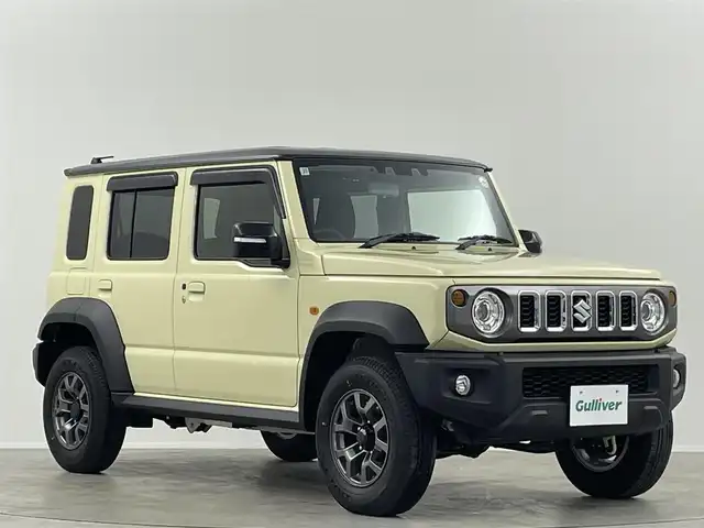 スズキ ジムニー ノマド FC 埼玉県 2025(令7)年 0.1千km ベージュ 登録済未使用車 温シート 追従走行 ETC ミラーシート コーナーセンサー オートハイビーム レーンキープアシスト ダウンヒルアシストコントロール 背面タイヤ 衝突軽減システム スマートキー