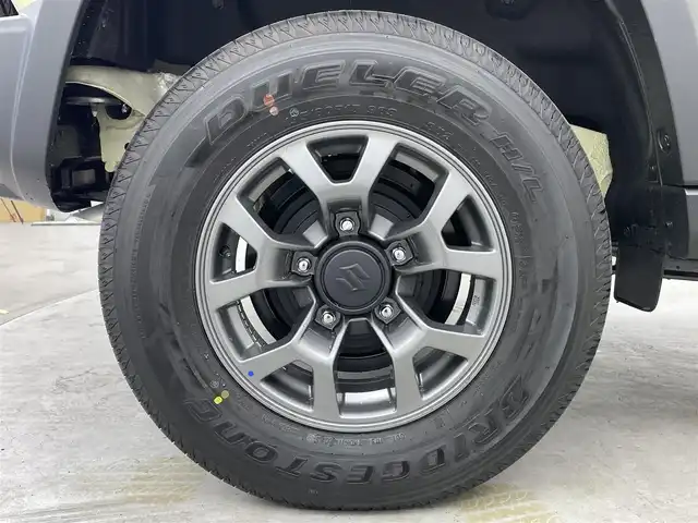 スズキ ジムニー ノマド FC 埼玉県 2025(令7)年 0.1千km ベージュ 登録済未使用車 温シート 追従走行 ETC ミラーシート コーナーセンサー オートハイビーム レーンキープアシスト ダウンヒルアシストコントロール 背面タイヤ 衝突軽減システム スマートキー