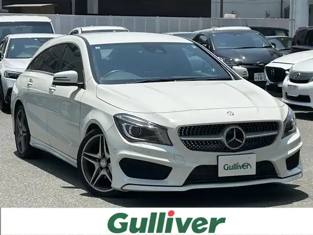 メルセデス・ベンツ ＣＬＡ１８０ Sブレイク　スポーツ 福岡県 2015(平27)年 1.4万km 白 ワンオーナー/禁煙車/純正ディーラーナビ/（Bluetooth・フルセグ・DVD・CD）/クルーズコントロール/パドルシフト/アイドリングストップ/クリアランスソナー/前席シートヒーター/ハーフレザーシート/運転席パワーシート/メモリシート/純正アルミホイール/純正フロアマット/電動パーキングブレーキ/プッシュスタート/ETC/ウィンカーミラー/保証書/取扱説明書/スペアキー×１