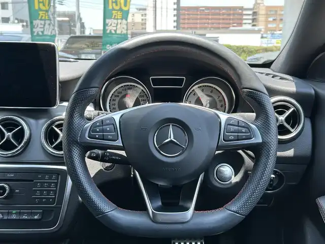メルセデス・ベンツ ＣＬＡ１８０ Sブレイク　スポーツ 福岡県 2015(平27)年 1.4万km 白 ワンオーナー/禁煙車/純正ディーラーナビ/（Bluetooth・フルセグ・DVD・CD）/クルーズコントロール/パドルシフト/アイドリングストップ/クリアランスソナー/前席シートヒーター/ハーフレザーシート/運転席パワーシート/メモリシート/純正アルミホイール/純正フロアマット/電動パーキングブレーキ/プッシュスタート/ETC/ウィンカーミラー/保証書/取扱説明書/スペアキー×１