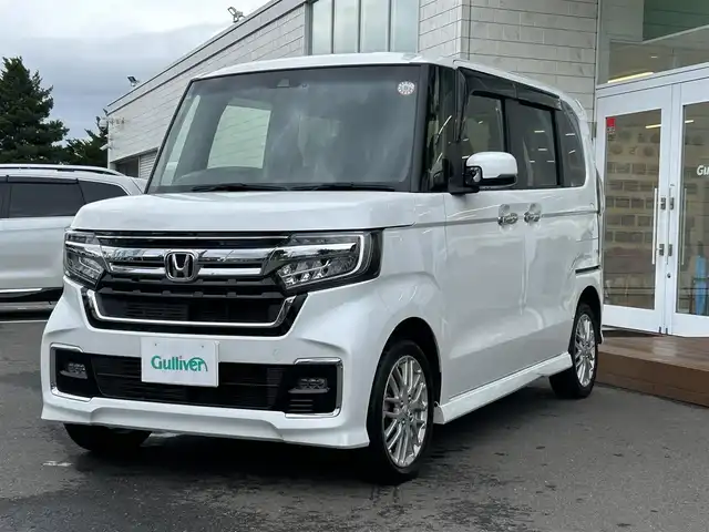 ホンダ Ｎ ＢＯＸ カスタム L ターボ 道央・札幌 2021(令3)年 2.8万km プラチナホワイトパール ・4WD/・ワンオーナー/・純正Gathersインターナビ/（AM/FM/CD/DVD/BT/USB/TV/SD）/・レーダークルーズ/・レーンキープ/・衝突被害軽減システム/・横滑り防止/・ステアリングスイッチ/・ハーフレザーシート/・両側パワースライドドア/・前後ドライブレコーダー/・ETC/・アイドリングストップ/・オートライト/・フォグランプ/・ヘッドライトレベライザー/・プッシュスタート/・電動格納ミラー/・サイドサンシェード/・純正エンジンスターター/・シートヒーター/・ドアバイザー/・ウィンカーミラー/・純正フロアマット/・パドルシフト/・積込純正14インチAW付冬タイヤ