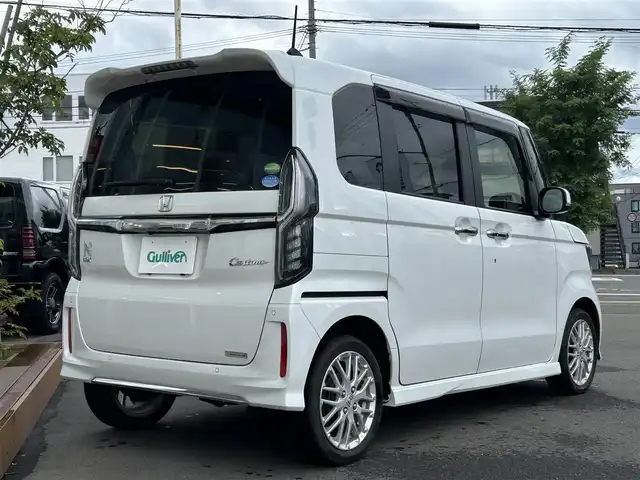 ホンダ Ｎ ＢＯＸ カスタム L ターボ 道央・札幌 2021(令3)年 2.8万km プラチナホワイトパール ・4WD/・ワンオーナー/・純正Gathersインターナビ/（AM/FM/CD/DVD/BT/USB/TV/SD）/・レーダークルーズ/・レーンキープ/・衝突被害軽減システム/・横滑り防止/・ステアリングスイッチ/・ハーフレザーシート/・両側パワースライドドア/・前後ドライブレコーダー/・ETC/・アイドリングストップ/・オートライト/・フォグランプ/・ヘッドライトレベライザー/・プッシュスタート/・電動格納ミラー/・サイドサンシェード/・純正エンジンスターター/・シートヒーター/・ドアバイザー/・ウィンカーミラー/・純正フロアマット/・パドルシフト/・積込純正14インチAW付冬タイヤ