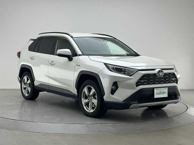 トヨタ ＲＡＶ４ ハイブリットG 兵庫県 2019(令1)年 7.7万km ホワイトパールクリスタルシャイン 純正9インチナビ（CD/DVD・FM/AM・BT・フルセグ）/バックカメラ/パワーバックドア/ETC2.0/皮シート/パワーシート（D席）/シートヒーター（D/N席）/シートメモリー（D席）/ステアリングヒーター/追従式クルーズコントロール/純正AW18インチ/純正フロアマット/プッシュスタート/スマートキー2本/BSM/置くだけ充電/電動パーキング/オートブレーキホールド/デジタルインナーミラー/前後ドラレコ（前純正・後ろ社外）/ルーフレール/チャイルドシート対応/スペアタイヤ一本/４WD/プリクラッシュセーフティー