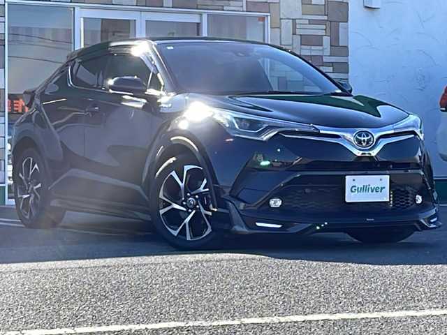 トヨタ Ｃ－ＨＲ G 徳島県 2018(平30)年 2.2万km ブラックマイカ 純正7型SDナビNSZT-W68T/（DISC/ラジオ/SD/BT/フルセグ）/バックカメラ/追従式クルーズコントロール/ブラインドスポットモニター/オートブレーキホールド/モデリスタエアロ/コーナーセンサ/LEDヘッドライト/純正18AW/ハーフレザーシート/前席シートヒーター/ナノイー/フォグライト/電動格納ミラー/ドアバイザー