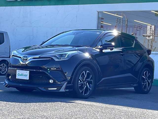 トヨタ Ｃ－ＨＲ G 徳島県 2018(平30)年 2.2万km ブラックマイカ 純正7型SDナビNSZT-W68T/（DISC/ラジオ/SD/BT/フルセグ）/バックカメラ/追従式クルーズコントロール/ブラインドスポットモニター/オートブレーキホールド/モデリスタエアロ/コーナーセンサ/LEDヘッドライト/純正18AW/ハーフレザーシート/前席シートヒーター/ナノイー/フォグライト/電動格納ミラー/ドアバイザー