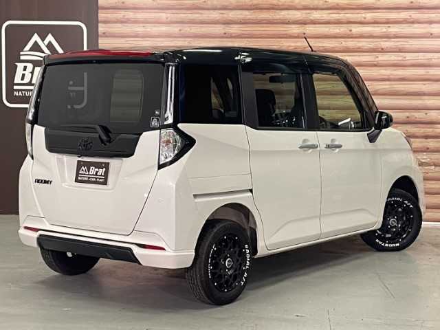 トヨタ ルーミー カスタムG 岩手県 2022(令4)年 3.1万km ブラックマイカメタリック/パールホワイト2トーン AIS検査済み【2501036392】/【社外パーツ取付有】/純正LEDヘッドライト/オートライト/バックカメラ/両側パワースライドドア/ディスプレイオーディオ/USB入力端子/ETC/フルセグテレビ/前席シートヒーター/コーナーセンサー/衝突被害軽減ブレーキ/アイドリングストップ/14インチAW　BRUT （社外）/マッドスター　ラジアル　A/T（社外）/エスペリア　リフトアップキット（社外）/CLS FOX前後バンパー（社外）/社外パーツ取付有