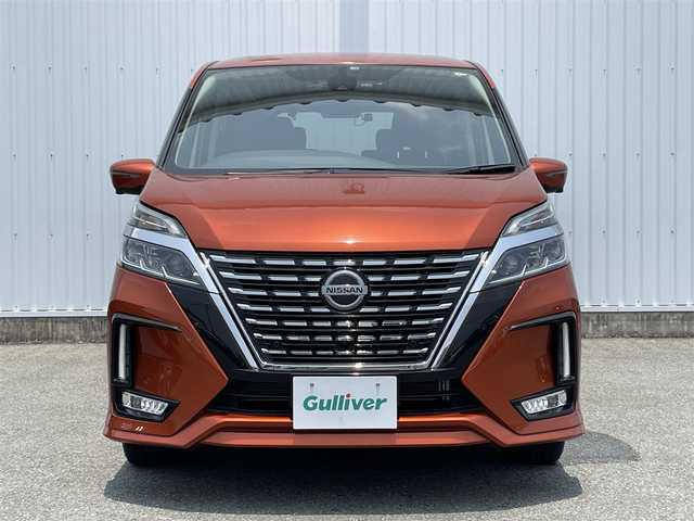 日産 セレナ ハイウェイスター 福岡県 2019(令1)年 1.2万km オレンジ プロパイロット搭載車/エマージェンシーブレーキ/側方支援/レーンキープアシスト/BSM/純正10インチナビ/（CD/DVD/SD/BT/USB/FM/AM）/フルセグTV/アラウンドビューモニター/フリップダウンモニター/ドラレコ前後2個付き/・純正が前方のみ/・社外が前後/両側パワースライド/ハンズフリースライドドア/電動パーキング/社外マット/純正アルミホイール/ドアバイザー/プッシュスタート/スペアキー1本/取説/カラーコード　EBL