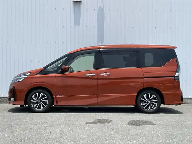 日産 セレナ ハイウェイスター 福岡県 2019(令1)年 1.2万km オレンジ プロパイロット搭載車/エマージェンシーブレーキ/側方支援/レーンキープアシスト/BSM/純正10インチナビ/（CD/DVD/SD/BT/USB/FM/AM）/フルセグTV/アラウンドビューモニター/フリップダウンモニター/ドラレコ前後2個付き/・純正が前方のみ/・社外が前後/両側パワースライド/ハンズフリースライドドア/電動パーキング/社外マット/純正アルミホイール/ドアバイザー/プッシュスタート/スペアキー1本/取説/カラーコード　EBL