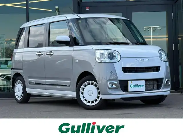 ダイハツ ムーヴ キャンバス ストライプス G ターボ 東京都 2023(令5)年 1.5万km シャイニングホワイトパール/スムーズグレーマイカメタリック スマートアシスト/・衝突回避支援ブレーキ/・衝突警報/・誤発進抑制制御/・車線逸脱警報/・路外逸脱警報/・ふらつき警報/・オートハイビーム/・アダプティブクルーズコントロール/純正ナビ/（CD/DVD/USB/フルセグTV）/・パノラマモニター/両側電動スライド/シートヒーター（運転席/助手席）/プッシュスタート/ＬＥＤヘッドライト　/フォグランプ/純正フロアマット/スマートキー/取扱説明書