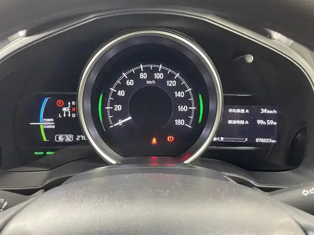 ホンダ フィット ハイブリット F 福島県 2017(平29)年 7.1万km クリスタルブラックパール ＨＤＤナビゲーション　/バックカメラ　/ＥＴＣ　/冬タイヤ車載　/プッシュスタート　/・スマートキー　/ドアバイザー　/純正フロアマット　/ＵＳＢ入力端子　/革巻きステアリング　/・チルトステリング　/・ステアリングスイッチ/ヘッドライトレベライザー/車両接近通報装置