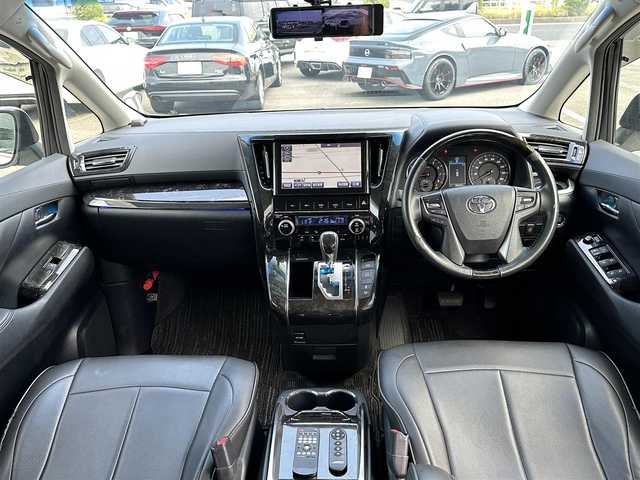 トヨタ ヴェルファイア Z 三重県 2016(平28)年 8.1万km ホワイトパールクリスタルシャイン ♪車検R9年3月30日/♪モデリスタ(エアロ/グリル/マフラー)/♪純正メーカーナビ/・フルセグ・Bluetooth・DVD再生・CD録音/♪バックカメラ/♪純正フリップダウンモニター/♪デジタルインナーミラー（ドライブレコーダー付）/♪両側パワースライドドア/♪スマートキー/♪プッシュスタート/♪LEDヘッドライト/♪LEDフォグライト /♪オートライト/♪クリアランスソナー/♪オートブレーキホールド/♪レザー調シートカバー/♪革巻きステアリング/♪ステアリングスイッチ/♪ビルトインETC/♪サイド・カーテン・ニーエアバック/♪横滑り防止機能/♪nanoe/♪プライバシーガラス/♪ドアバイザー/♪フロアマット