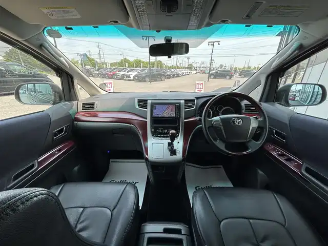 トヨタ ヴェルファイア 3．5Z サイドリフトアップ 道央・札幌 2009(平21)年 10.6万km ブラック ４WD/純正HDDナビ/AM/FM/CD/DVD/BT/フルセグ/ETC/バックカメラ/社外フリップダウンモニター/プッシュスタート/スマートキー/スペアキー/社外エンジンスターター/社外シートカバー/両側パワースライドドア/クルーズコントロール/福祉車両/４WD切替スイッチ/ステアリングスイッチ/純正フロアマット/電格ミラー/ウィンカーミラー/ドアバイザー/前後コーナーセンサー