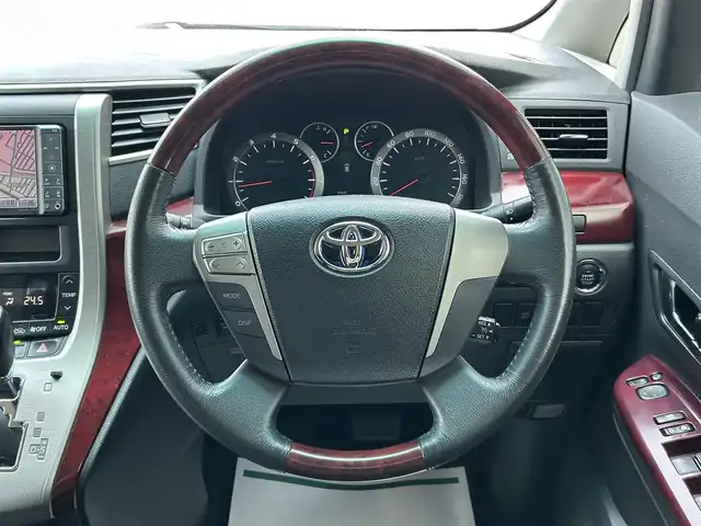 トヨタ ヴェルファイア 3．5Z サイドリフトアップ 道央・札幌 2009(平21)年 10.6万km ブラック ４WD/純正HDDナビ/AM/FM/CD/DVD/BT/フルセグ/ETC/バックカメラ/社外フリップダウンモニター/プッシュスタート/スマートキー/スペアキー/社外エンジンスターター/社外シートカバー/両側パワースライドドア/クルーズコントロール/福祉車両/４WD切替スイッチ/ステアリングスイッチ/純正フロアマット/電格ミラー/ウィンカーミラー/ドアバイザー/前後コーナーセンサー