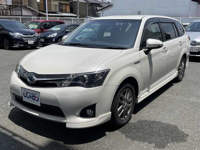 トヨタ カローラ フィールダー HV G エアロツアラー W×B 愛知県 2013(平25)年 7万km ホワイトパールクリスタルシャイン (株)IDOMが運営する【じしゃロン豊川店】の自社ローン専用車両になります。こちらは現金またはオートローンご利用時の価格です。自社ローンご希望の方は別途その旨お申付け下さい/ 純正ディーラーナビ/ バックカメラ/ ETC/ 革巻ステアリング/ ステアリングスイッチ/ ウインカーミラー/ ハーフレザーシート/ トノカバー/ ドアバイザー/ 純正フロアマット