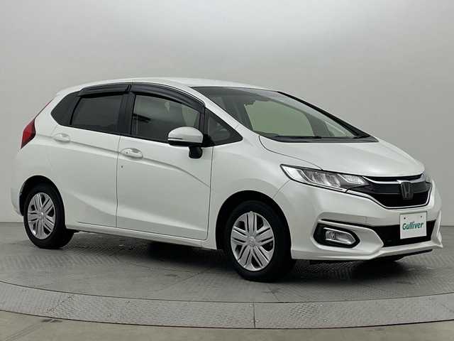 ホンダ フィット 13G L ホンダセンシング 新潟県 2019(平31)年 1.6万km プラチナホワイトパール ホンダセンシング/純正8インチSDナビ/　CD/DVD/Bluetooth/フルセグTV/バックカメラ/レーダークルーズコントロール/LEDヘッドライト/LEDフォグランプ/電格ミラー/ウィンカーミラー/ドラレコ/スマートキー/ビルトインETC