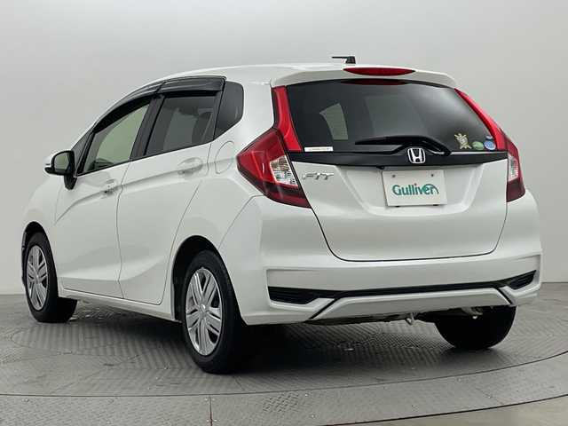ホンダ フィット 13G L ホンダセンシング 新潟県 2019(平31)年 1.6万km プラチナホワイトパール ホンダセンシング/純正8インチSDナビ/　CD/DVD/Bluetooth/フルセグTV/バックカメラ/レーダークルーズコントロール/LEDヘッドライト/LEDフォグランプ/電格ミラー/ウィンカーミラー/ドラレコ/スマートキー/ビルトインETC