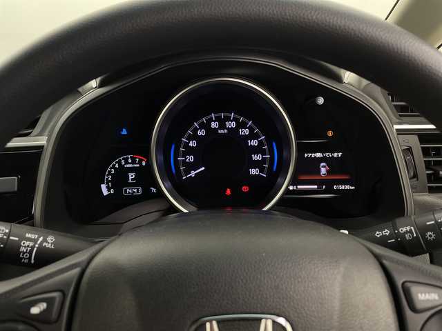 ホンダ フィット 13G L ホンダセンシング 新潟県 2019(平31)年 1.6万km プラチナホワイトパール ホンダセンシング/純正8インチSDナビ/　CD/DVD/Bluetooth/フルセグTV/バックカメラ/レーダークルーズコントロール/LEDヘッドライト/LEDフォグランプ/電格ミラー/ウィンカーミラー/ドラレコ/スマートキー/ビルトインETC