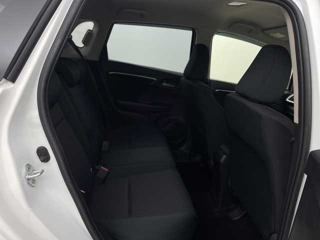 ホンダ フィット 13G L ホンダセンシング 新潟県 2019(平31)年 1.6万km プラチナホワイトパール ホンダセンシング/純正8インチSDナビ/　CD/DVD/Bluetooth/フルセグTV/バックカメラ/レーダークルーズコントロール/LEDヘッドライト/LEDフォグランプ/電格ミラー/ウィンカーミラー/ドラレコ/スマートキー/ビルトインETC