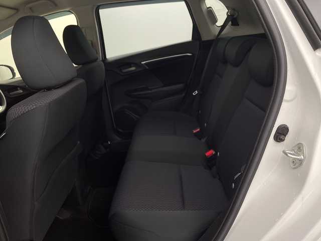 ホンダ フィット 13G L ホンダセンシング 新潟県 2019(平31)年 1.6万km プラチナホワイトパール ホンダセンシング/純正8インチSDナビ/　CD/DVD/Bluetooth/フルセグTV/バックカメラ/レーダークルーズコントロール/LEDヘッドライト/LEDフォグランプ/電格ミラー/ウィンカーミラー/ドラレコ/スマートキー/ビルトインETC