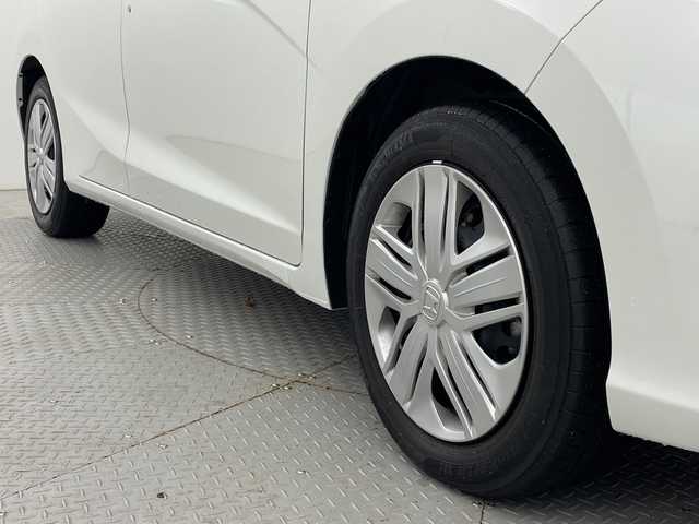 ホンダ フィット 13G L ホンダセンシング 新潟県 2019(平31)年 1.6万km プラチナホワイトパール ホンダセンシング/純正8インチSDナビ/　CD/DVD/Bluetooth/フルセグTV/バックカメラ/レーダークルーズコントロール/LEDヘッドライト/LEDフォグランプ/電格ミラー/ウィンカーミラー/ドラレコ/スマートキー/ビルトインETC