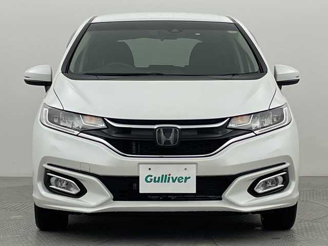 ホンダ フィット 13G L ホンダセンシング 新潟県 2019(平31)年 1.6万km プラチナホワイトパール ホンダセンシング/純正8インチSDナビ/　CD/DVD/Bluetooth/フルセグTV/バックカメラ/レーダークルーズコントロール/LEDヘッドライト/LEDフォグランプ/電格ミラー/ウィンカーミラー/ドラレコ/スマートキー/ビルトインETC