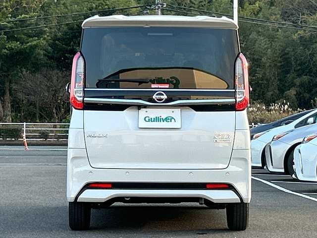 日産 ルークス ハイウェイスター Gターボ 佐賀県 2021(令3)年 5.7万km ホワイトパール/チタニウムグレー 2トーン 純正9インチナビゲーション/アラウンドビューモニター/前方ドライブレコーダー/片側パワースライドドア/左側ハンズフリースライドドア/車線逸脱警報/エマージェンシーブレーキ/LEDヘッドライト/フォグランプ/ヘッドライトレベライザー/純正15インチアルミホイール