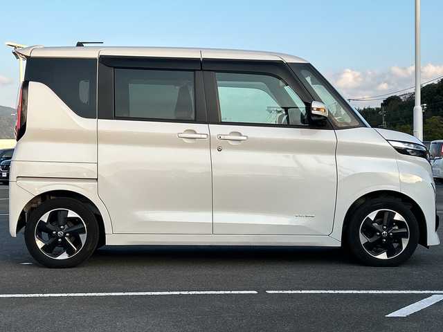 日産 ルークス ハイウェイスター Gターボ 佐賀県 2021(令3)年 5.7万km ホワイトパール/チタニウムグレー 2トーン 純正9インチナビゲーション/アラウンドビューモニター/前方ドライブレコーダー/片側パワースライドドア/左側ハンズフリースライドドア/車線逸脱警報/エマージェンシーブレーキ/LEDヘッドライト/フォグランプ/ヘッドライトレベライザー/純正15インチアルミホイール