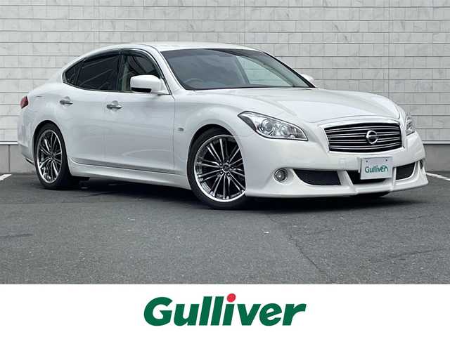 日産 フーガ 250GT タイプP 愛知県 2009(平21)年 7.1万km クリスタルホワイトパール ローダウンスプリング/純正ナビ/フルセグTV/バックビューモニター/ビルトインETC/クルーズコントロール/横滑り防止装置/HIDヘッドランプ/アクティブAFS/オートライト/オートエアコン/本革巻きステアリング/ステアリングスイッチ/ブラック革シート/前席パワーシート/シートヒーター/前席エアコンディショニングシート/運転席ドライビングポジションメモリー/助手席パワーオットマン/クレンツェアクエルド20インチアルミホイール/インテリジェントキー/禁煙車