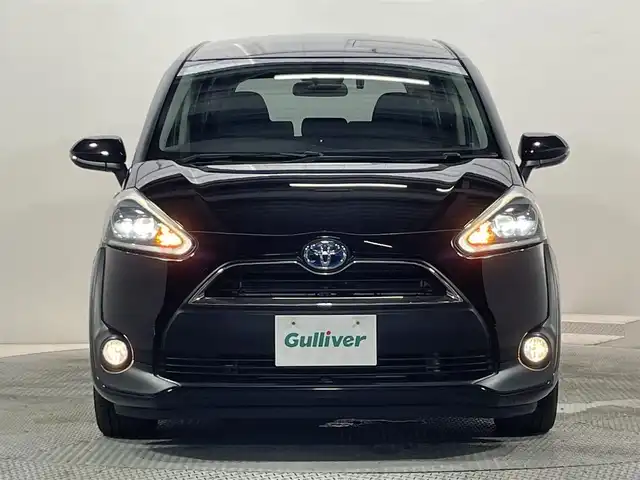 トヨタ シエンタ ハイブリッド G クエロ 大阪府 2018(平30)年 5.9万km クールボルドーガラスフレーク 純正ナビ　バックカメラ　ＢＴ　フルセグＴＶ　フリップダウンモニター　衝突軽減　レーンキープアシスト　シートヒーター　オートライト　ＬＥＤヘッドライト　両側パワースライドドア　ＥＴＣ　スマートキー