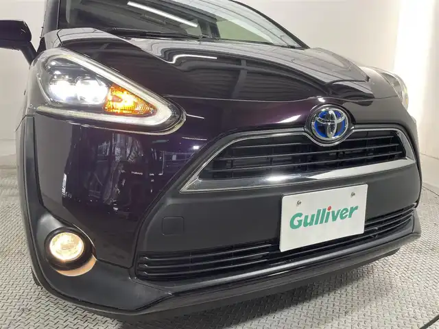 トヨタ シエンタ ハイブリッド G クエロ 大阪府 2018(平30)年 5.9万km クールボルドーガラスフレーク 純正ナビ　バックカメラ　ＢＴ　フルセグＴＶ　フリップダウンモニター　衝突軽減　レーンキープアシスト　シートヒーター　オートライト　ＬＥＤヘッドライト　両側パワースライドドア　ＥＴＣ　スマートキー