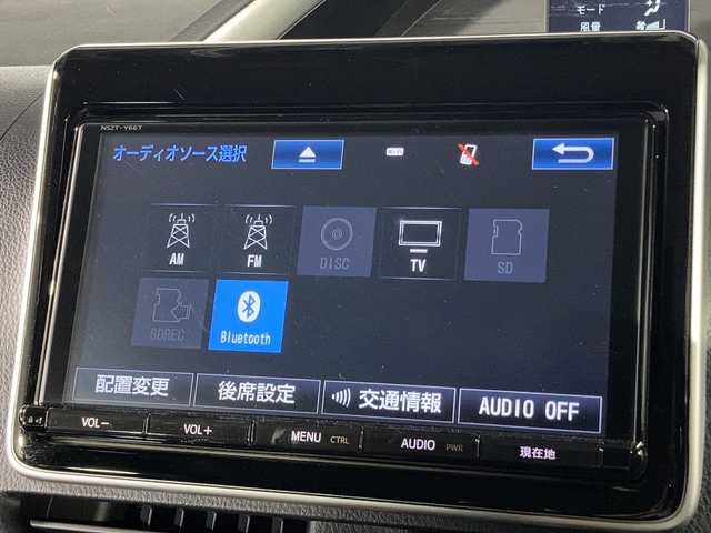 トヨタ ヴォクシー ZS 煌Ⅱ 沖縄県 2017(平29)年 6.7万km ブラック 県外仕入れ　/禁煙車/両側パワースライドドア/純正９インチナビ/【CD/DVD/フルセグTV/BT】/１２インチ後席フリップダウンモニター/バックカメラ/前方ドライブレコーダー/ビルトインETC/トヨタセーフティセンス/→プリクラッシュセーフティ/→レーンディパーチャーアラート/→オートマチックハイビーム/ステリングリモコン/オートライト/純正フロアマット/スマートキー/スペアキー