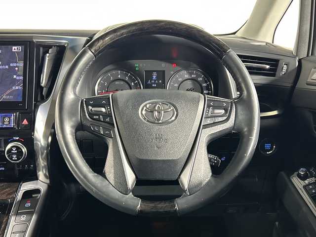 トヨタ ヴェルファイア Z Gエディション 神奈川県 2016(平28)年 7.7万km ホワイトパールクリスタルシャイン 社外10型ナビ【EX10】/・BT/フルセグTV/CD/DVD/USB/HDMI/バックカメラ/社外フリップダウンモニター/ツインムーンルーフ/両側電動スライドドア/パワーバックドア/MTモード/電動サイドブレーキ/オートブレーキホールド/革巻きステアリング/ステアリングスイッチ/Autoライト/クルーズコントロール/ステアリングヒーター/スマートキー/スペアキー/プッシュスタートボタン/ハーフレザーシート/パワーシート(D/N/2列目)/メモリシート(D)/オットマン/ETC/前後ドライブレコーダー/LEDヘッドライト/フォグランプ/電動格納ミラー/ウィンカーミラー/純正フロアマット/純正ドアバイザー/純正18インチアルミホイール