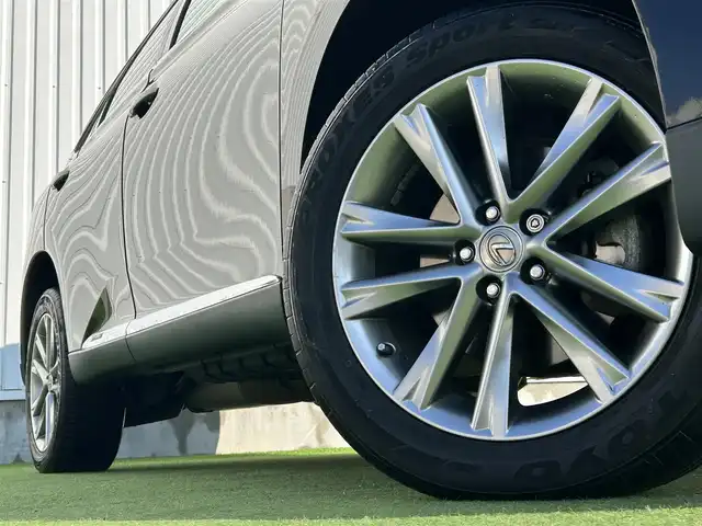 レクサス ＲＸ 450h バージョンL エアサス 香川県 2014(平26)年 8万km ブラック エアサスペンション（車高調）/純正ナビゲーション/【AM/FM/フルセグTV/BT/CD/DVD】/バックカメラ/プリクラッシュセーフティシステム/レーンキーピングアシスト/アダプティブハイビームシステム/ヘッドアップディスプレイ/前後クリアランスソナー/ステアリングヒーター/シートヒーター/エアシート（前席）/シートメモリー（前席）/パワーシート/ETC/LEDオートヘッドライト/LEDフォグランプ/ヘッドライトウォッシャー/100V電源/純正19インチアルミホイール/純正フロアマット/スマートキー/プッシュスタート