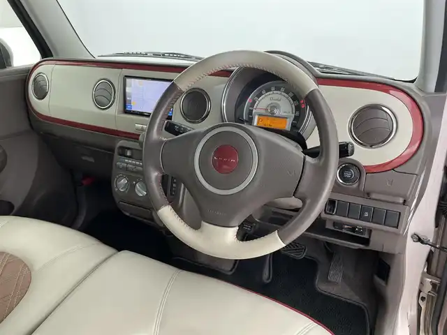 スズキ ラパン ショコラ G 滋賀県 2015(平27)年 6.4万km シャンパンピンクPM 社外ナビ/(CD/ワンセグTV)/ビルトインETC/ドライブレコーダー/レザーシート/HIDヘッドライト/純正フロアマット/純正14インチAW