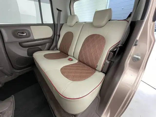 スズキ ラパン ショコラ G 滋賀県 2015(平27)年 6.4万km シャンパンピンクPM 社外ナビ/(CD/ワンセグTV)/ビルトインETC/ドライブレコーダー/レザーシート/HIDヘッドライト/純正フロアマット/純正14インチAW