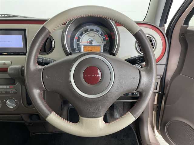 スズキ ラパン ショコラ G 滋賀県 2015(平27)年 6.4万km シャンパンピンクPM 社外ナビ/(CD/ワンセグTV)/ビルトインETC/ドライブレコーダー/レザーシート/HIDヘッドライト/純正フロアマット/純正14インチAW