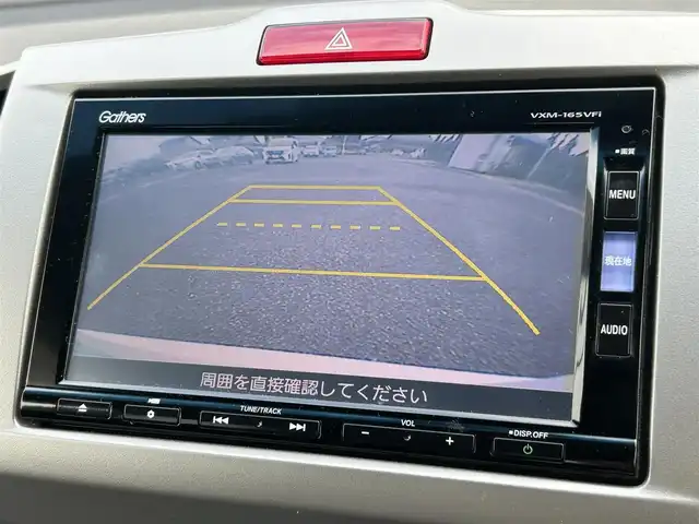 ホンダ フリード ハイブリット プレミアムエディション 熊本県 2016(平28)年 6.2万km ホワイトオーキッドパール 純正ナビ/・AM/FM/CD/DVD/・フルセグTV/・バックカメラ/後席フリップダウンモニター/クルーズコントロール/ドライブレコーダー/両側電動スライドドア/横滑り防止装置/ETC/革巻きステアリング/ステアリングスイッチ/革調シートカバー/オートライト/HIDヘッドライト/電動格納ミラー/プッシュスタート/スペアキー