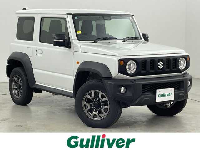 スズキ ジムニー シエラ JC 福岡県 2023(令5)年 2.9万km ピュアホワイトP 社外９型ナビ（フルセグＴＶ）　/バックカメラ　/ビルトインＥＴＣ　/クルーズコントロール　/コーナーセンサー　/衝突軽減ブレーキ　/レーンキープ　/ヒルディセントコントロール　/シートヒーター　/純正１５インチＡＷ