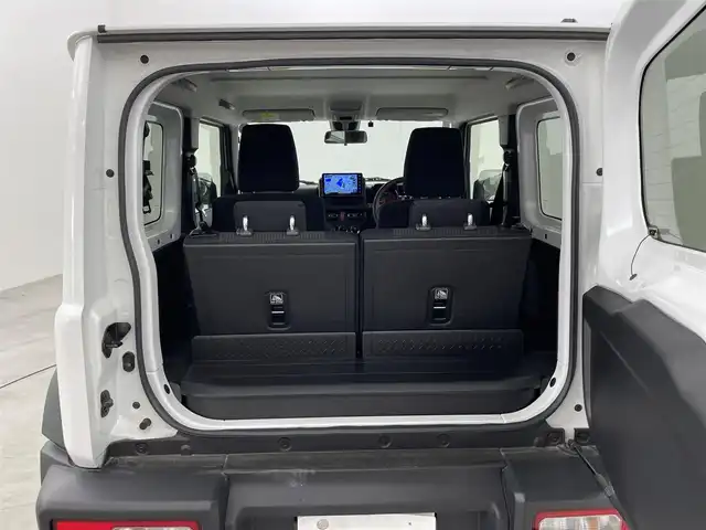 スズキ ジムニー シエラ JC 福岡県 2023(令5)年 2.9万km ピュアホワイトP 社外９型ナビ（フルセグＴＶ）　/バックカメラ　/ビルトインＥＴＣ　/クルーズコントロール　/コーナーセンサー　/衝突軽減ブレーキ　/レーンキープ　/ヒルディセントコントロール　/シートヒーター　/純正１５インチＡＷ