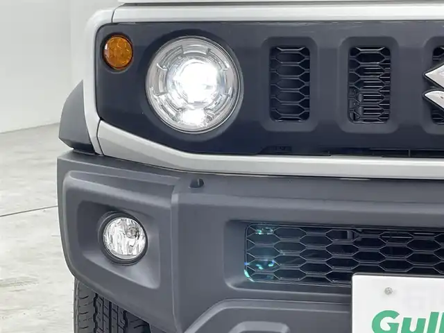 スズキ ジムニー シエラ JC 福岡県 2023(令5)年 2.9万km ピュアホワイトP 社外９型ナビ（フルセグＴＶ）　/バックカメラ　/ビルトインＥＴＣ　/クルーズコントロール　/コーナーセンサー　/衝突軽減ブレーキ　/レーンキープ　/ヒルディセントコントロール　/シートヒーター　/純正１５インチＡＷ