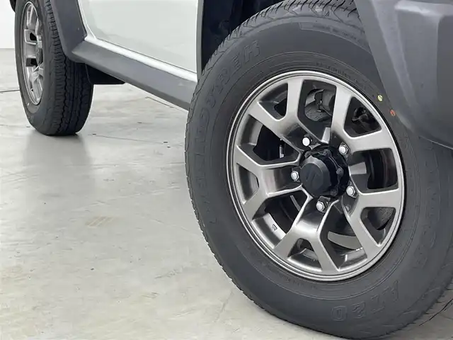 スズキ ジムニー シエラ JC 福岡県 2023(令5)年 2.9万km ピュアホワイトP 社外９型ナビ（フルセグＴＶ）　/バックカメラ　/ビルトインＥＴＣ　/クルーズコントロール　/コーナーセンサー　/衝突軽減ブレーキ　/レーンキープ　/ヒルディセントコントロール　/シートヒーター　/純正１５インチＡＷ