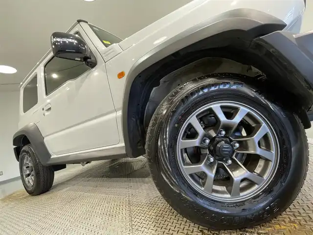 スズキ ジムニー シエラ JC 愛知県 2023(令5)年 2.9万km ピュアホワイトP 9インチナビ/（Bluetooth/AM/FM/フルセグTV/Carplay）/衝突軽減ブレーキ/ビルトインETC/シートヒーター/LEDヘッドライト/バックカメラ/クルーズコントロール/レーンキープアシスト/プッシュスタートボタン/スマートキー/純正15インチAW/純正フロアマット