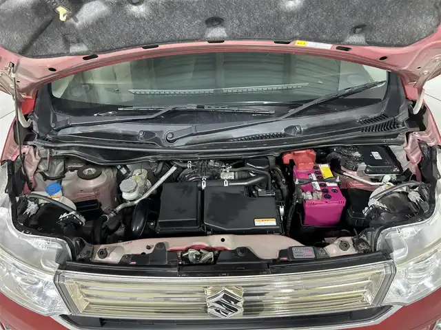 スズキ ワゴンＲ スティングレー X 佐賀県 2015(平27)年 2.8万km フェニックスレッドパール 社外7型ナビ/（ＡＭ/ＦＭ/ワンセグTV）/バックカメラ/シートヒーター/オートエアコン/衝突被害軽減システム/ウィンカーミラーカバーゴールド/革巻きステアリング/ステアリングスイッチ/HIDヘッドライト/盗難防止装置/横滑り防止装置/オートライト/スマートキー/スペアキー有/プッシュスタート/純正フロアマット/純正15インチアルミホイール/ドアバイザー