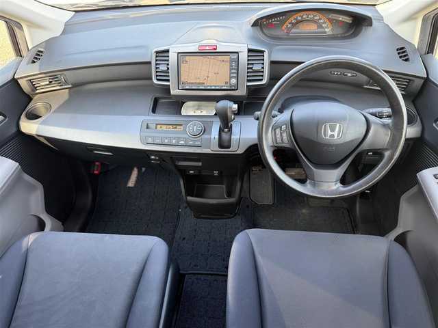 ホンダ フリード Gエアロ Lパッケージ 岩手県 2009(平21)年 10.6万km プレミアムブラキッシュパール 純正ＨＤＤナビ　バックカメラ　電動スライドドア TV 純正15インチアルミホイール HIDヘッドライト