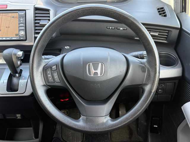 ホンダ フリード Gエアロ Lパッケージ 岩手県 2009(平21)年 10.6万km プレミアムブラキッシュパール 純正ＨＤＤナビ　バックカメラ　電動スライドドア TV 純正15インチアルミホイール HIDヘッドライト