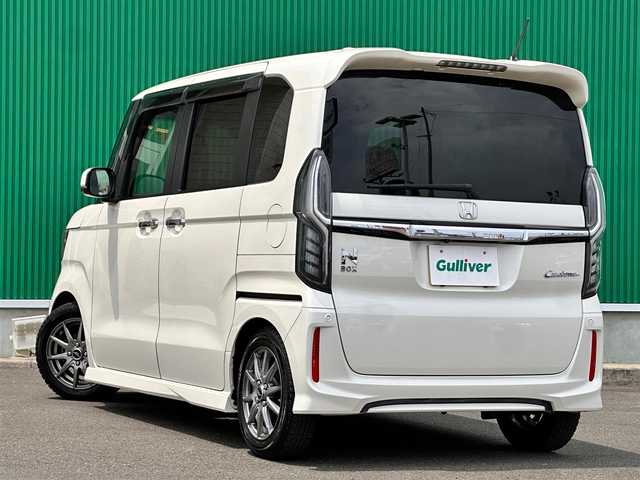 ホンダ Ｎ ＢＯＸ カスタム G L ホンダセンシング 宮城県 2018(平30)年 4.1万km プレミアムホワイトパールⅡ ホンダセンシング/社外SDナビ/【CD・DVD・SD・BT・フルセグTV】/バックカメラ/両側パワースライドドア/社外ドライブレコーダー/レーダークルーズコントロール/レーンキープアシスト/横滑り防止装置/先行発進告知/アイドリングストップ/ステアリングスイッチ/リアサンシェード/コーナーセンサー/タナベダウンサス/オートライト/LEDヘッドライト/フォグライト/スマートキー/ETC