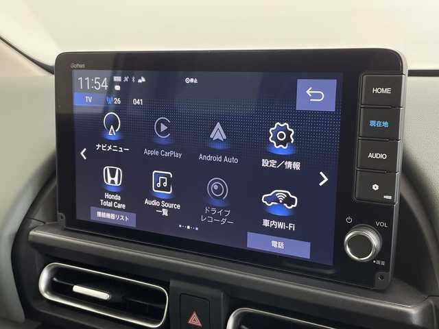 ホンダ フリード クロスター 新潟県 2024(令6)年 0.3万km プラチナホワイトパール 純正メモリナビ/（BT/FM/AM/フルセグTV）/バックカメラ/ステアリングスイッチ/ブラインドスポットモニター/前後ドライブレコーダー/両側パワースライドドア/ハーフレザーシート/シートヒーター/純正LEDオートヘッドライト/フォグライト/スペアキー/ETC