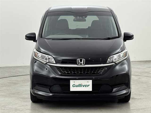 ホンダ フリード ハイブリット G ホンダセンシング 福岡県 2020(令2)年 2.8万km 黒 純正９型ナビ／フルセグＴＶ　/バックカメラ　/ビルトインＥＴＣ　/前方ドラレコ　/レーダークルコン　/コーナーセンサー　/衝突軽減ブレーキ　/レーンキープ　/両側電動スライドドア　/ハーフレザーシート　/シートヒーター　/LEDヘッドライト　/純正１５インチアルミホイール